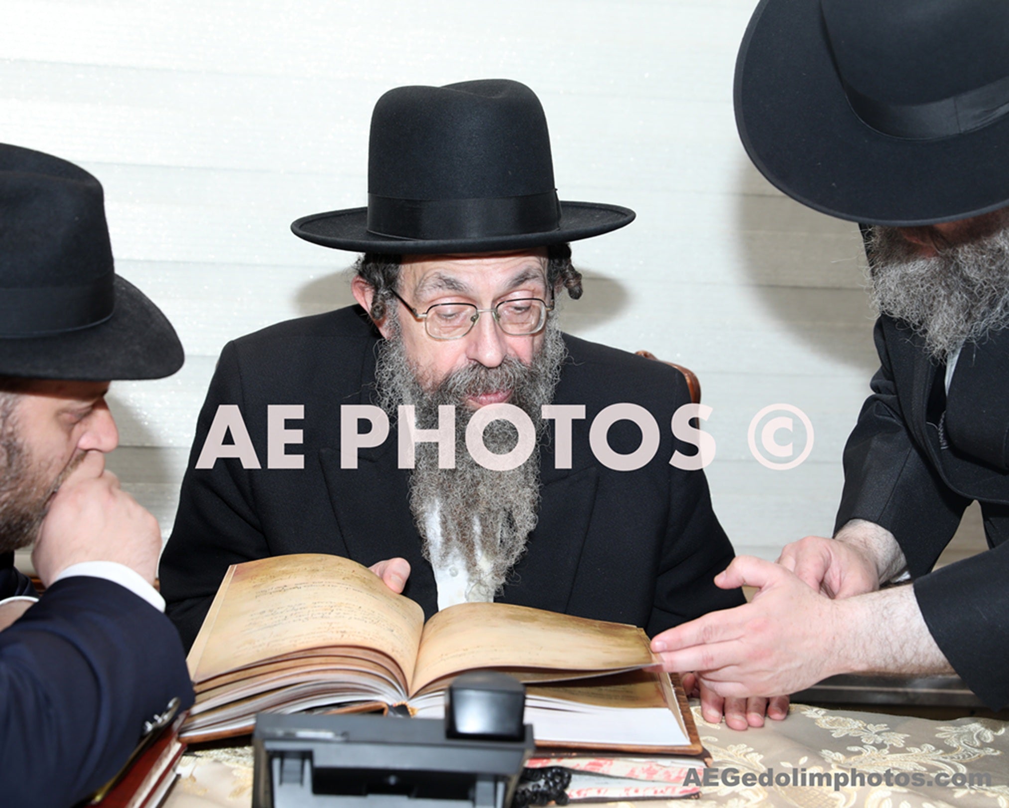 Stuchina Rebbe with the copy of Siddur Baal Shem Tov