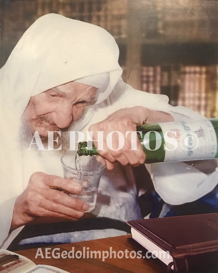 Baba Sali pouring Arak