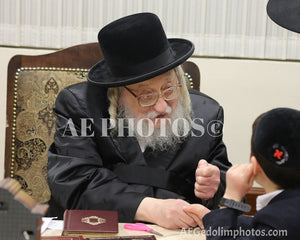 Rachmastrivka Rebbe with a little child